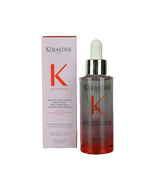 K&eacute;rastase Genesis Anti Hair-Fall Fortifying Serum 90mL in a clear glass pipette bottle with a pink-to-coral gradient and silver dropper cap, alongside its blush pink packaging box.
