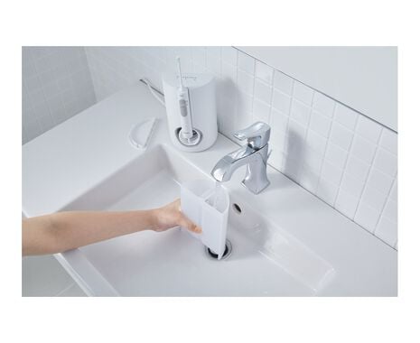 Oral Irrigator with Orthodontic Nozzle