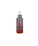 K&eacute;rastase Genesis Anti Hair-Fall Fortifying Serum 90mL in a clear glass pipette bottle with a pink-to-coral gradient and silver dropper cap.